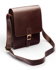 Men's leather messenger bag with buckle, brown, side