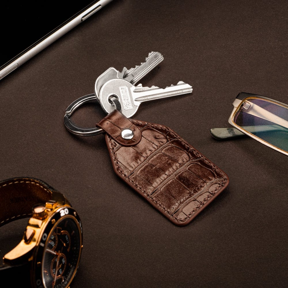 Rectangular leather key fob, brown croc, lifestyle