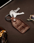 Rectangular leather key fob, brown croc, lifestyle