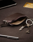 Small leather coin purse with key chain, brown, lifestyle