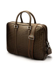 The Tressé leather laptop bag, brown woven, with shoulder strap