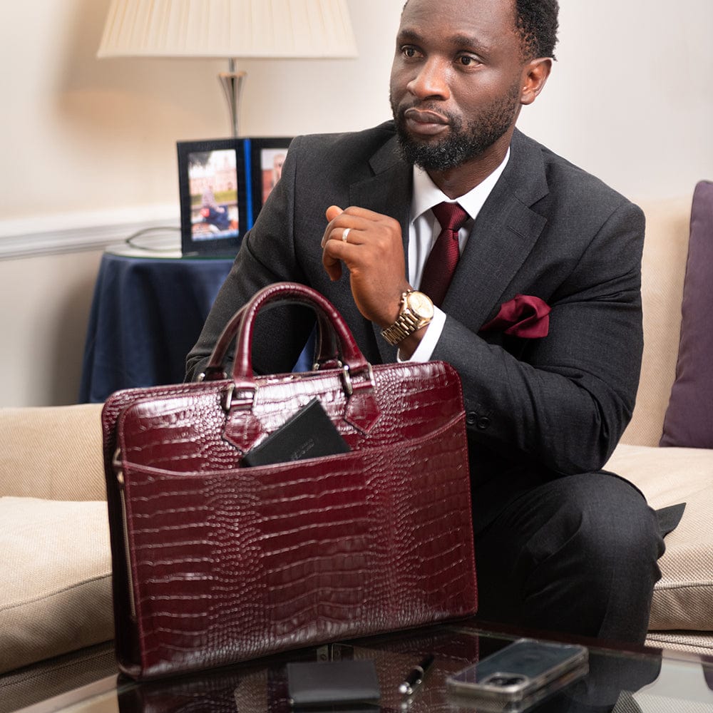 Leather 13" laptop bag, burgundy croc, lifestyle view