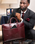 Leather 13" laptop bag, burgundy croc, lifestyle view