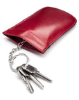 Leather key case with squeeze spring opening, burgundy, open