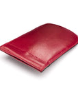 Leather key case with squeeze spring opening, burgundy, closed