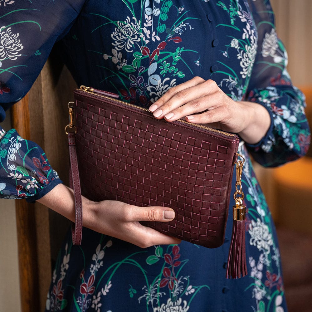 Leather woven cross body bag, burgundy, lifestyle