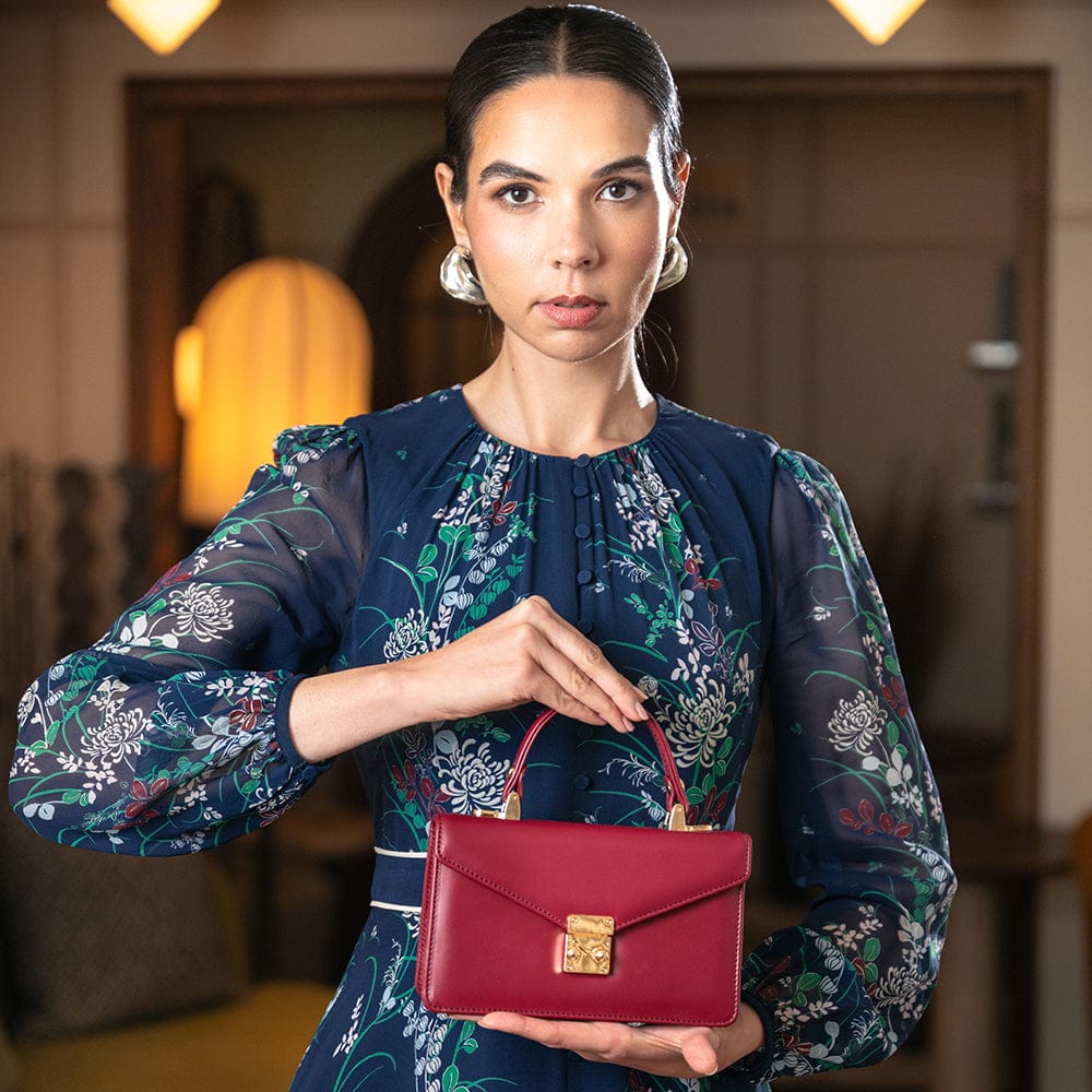 Maya top handle bag, burgundy, lifestyle