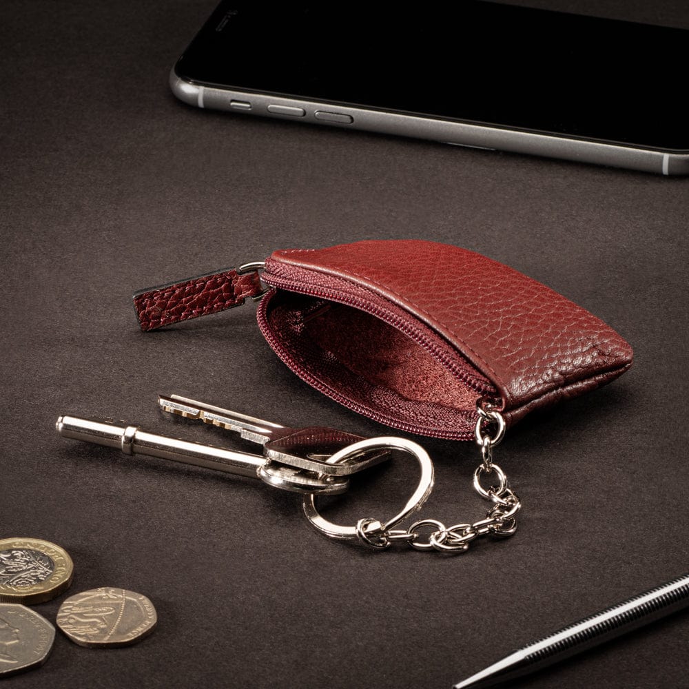 Miniature leather coin purse with key chain, burgundy, lifestyle