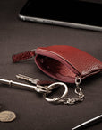 Miniature leather coin purse with key chain, burgundy, lifestyle