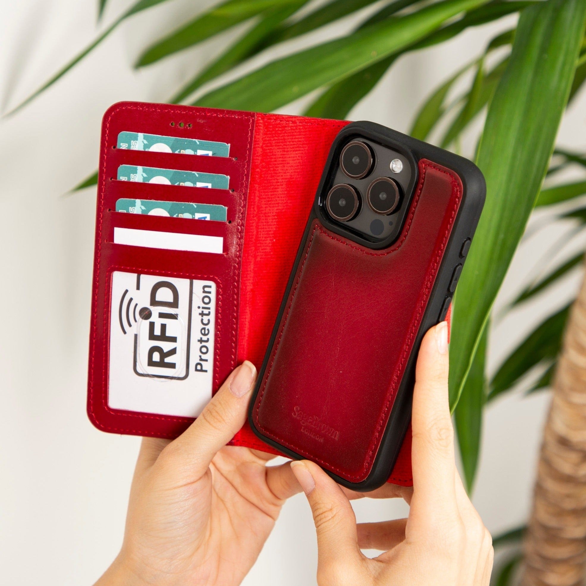 iPhone 15 Pro case in leather with RFID, burnished red, lifestyle view