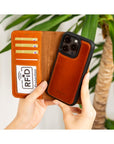 iPhone 15 Pro case in leather with RFID, burnished tan, lifestyle