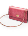 Leather chain bag, cerise pink croc, side view