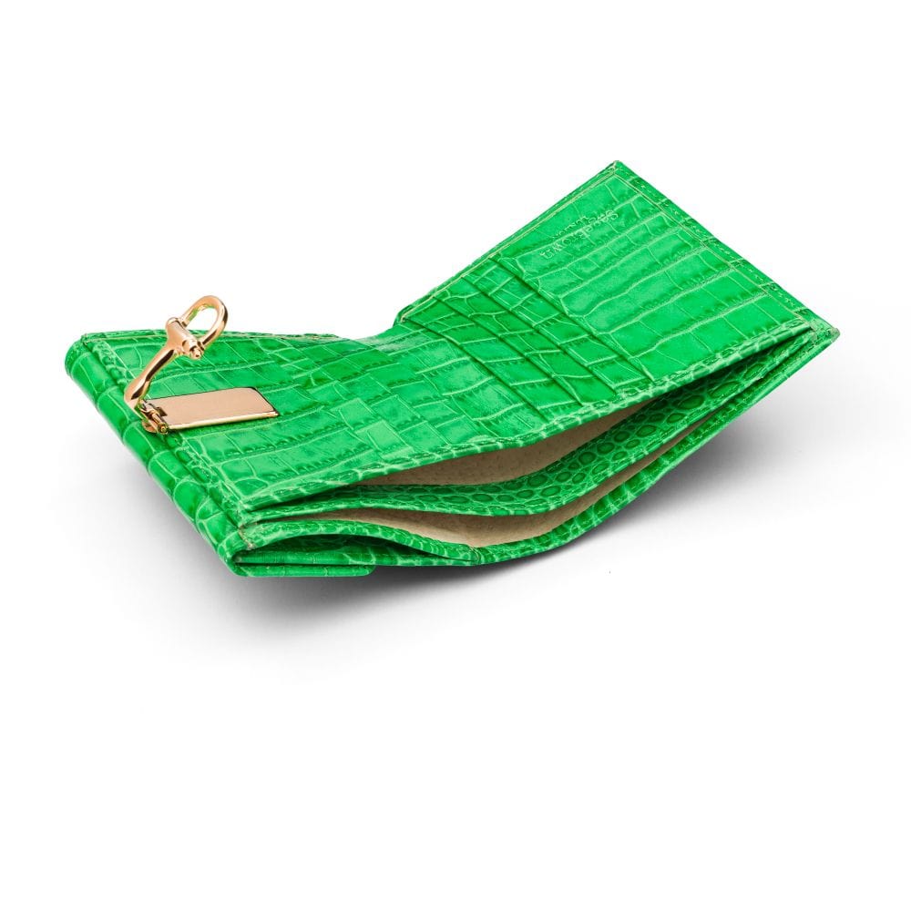 Leather purse with equestrain clasp, emerald croc, inside