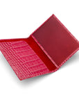 Luxury leather passport cover, cerise pink croc, open