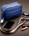 Leather cross body camera bag, cobalt, lifestyle