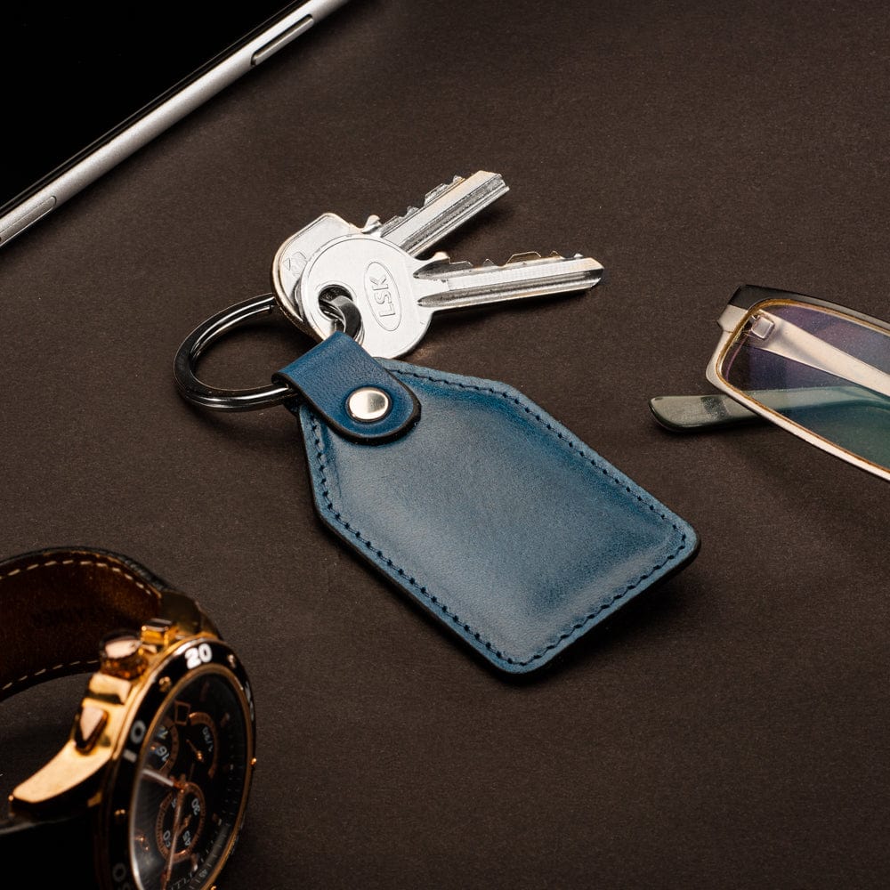Rectangular leather key fob, cobalt, lifestyle