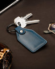 Rectangular leather key fob, cobalt, lifestyle