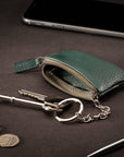 Miniature leather coin purse with key chain, dark green, lifestyle