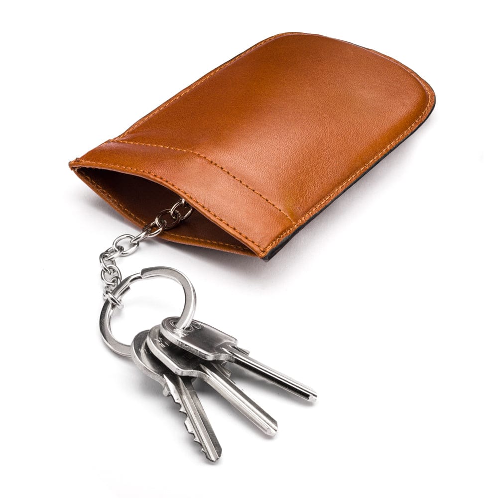 Leather key case with squeeze spring opening, havana tan, open