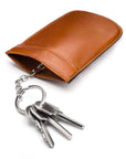 Leather key case with squeeze spring opening, havana tan, open