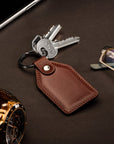 Rectangular leather key fob, dark tan, lifestyle