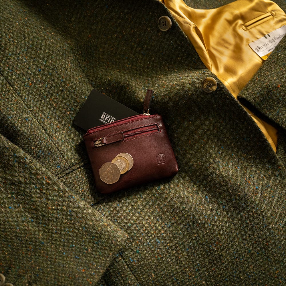 RFID Small leather zip coin pouch, dark tan, lifestyle view