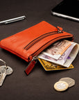 RFID Small leather zip coin pouch, havana tan, lifestyle