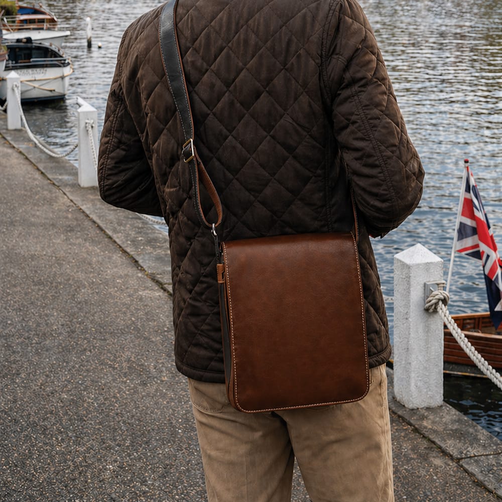 Small leather messenger bag, dark tan, lifestyle