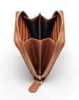 Small zip around woven leather accordion purse, tan, side