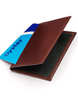 Leather travel card wallet, dark tan with green, front