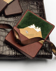 Leather business card holder with magnetic closure, dark tan with green