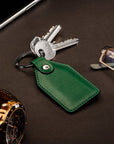 Rectangular leather key fob, emerald, lifestyle