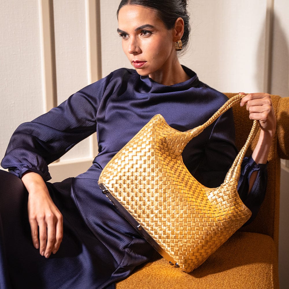 Woven leather shoulder bag, gold, lifestyle