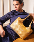 Woven leather shoulder bag, gold, lifestyle