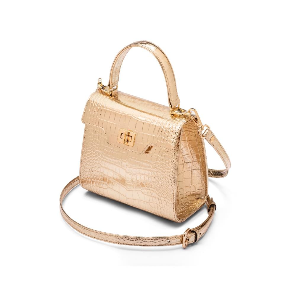Mini leather Morgan Bag, top handle bag, gold croc, side view