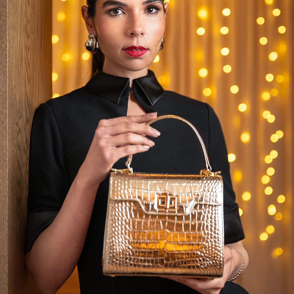 Mini leather Morgan Bag, top handle bag, gold croc, lifestyle