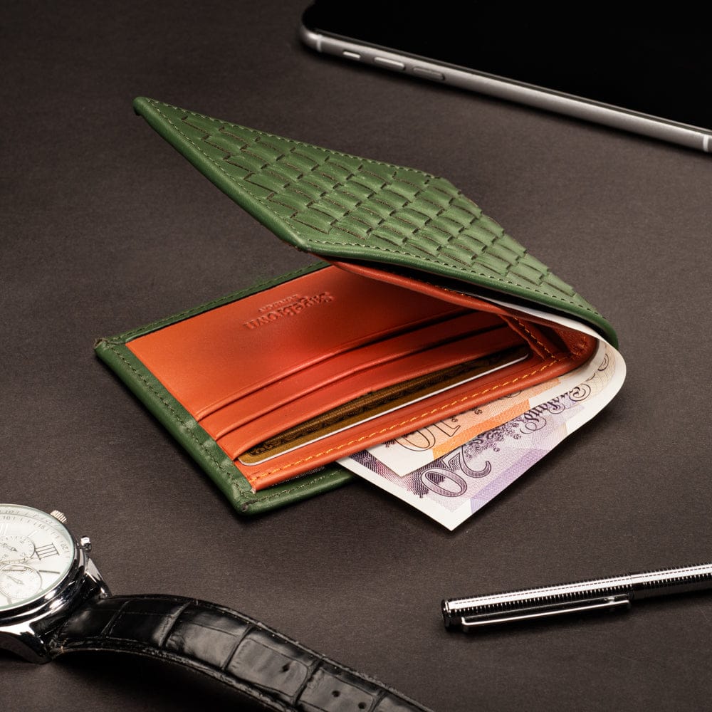Woven leather wallet with 6 credit card slots, green with orange, lifestyle
