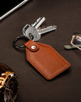 Rectangular leather key fob, havana tan, lifestyle