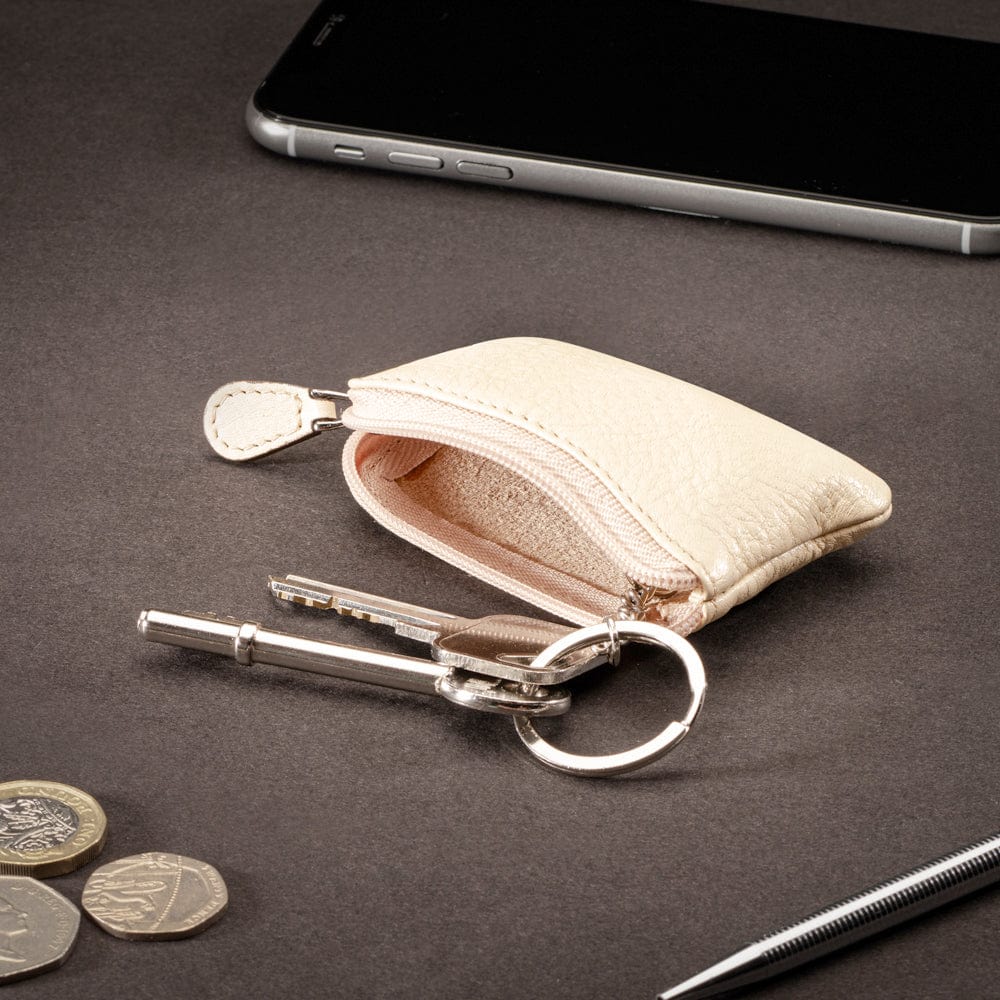 Miniature leather coin purse with key chain, ivory, lifestyle