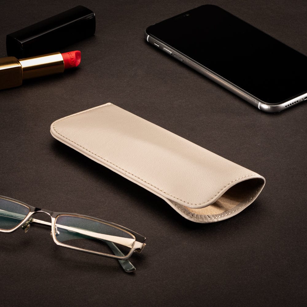 Small leather glasses case, soft ivory, lifestyle