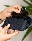 Leather glasses case, woven navy, lifestyle view