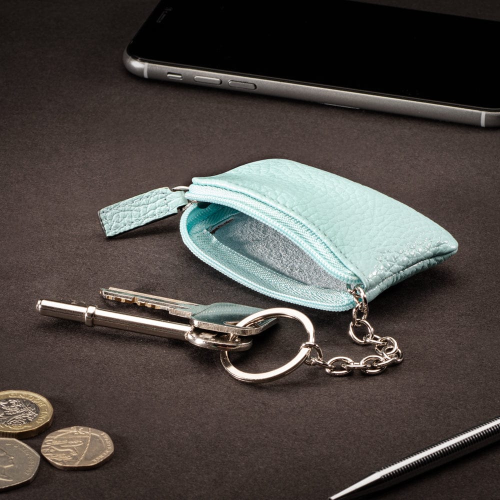 Miniature leather coin purse with key chain, light blue, lifestyle