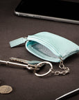 Miniature leather coin purse with key chain, light blue, lifestyle