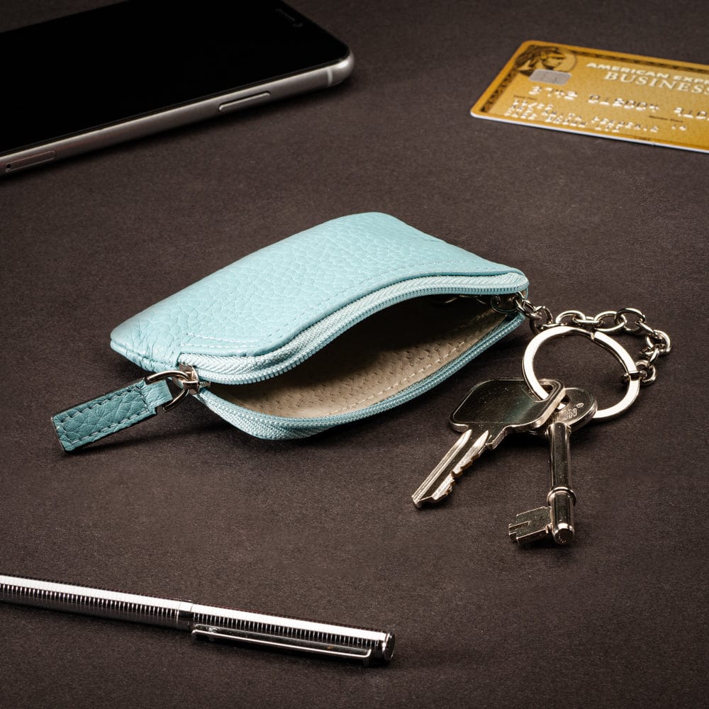 Small leather coin purse with key chain, light blue, lifestyle