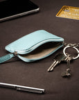 Small leather coin purse with key chain, light blue, lifestyle