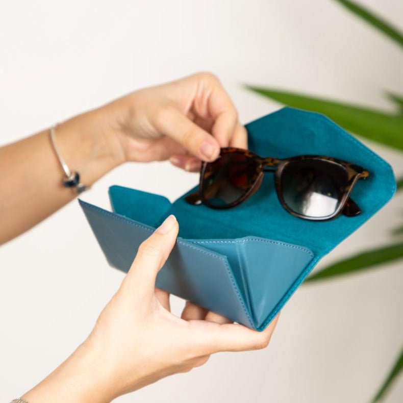 Triangular leather glasses case, light blue, lifestyle view