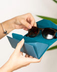 Triangular leather glasses case, light blue, lifestyle view