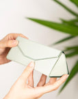 Triangular leather glasses case, mint green, lifestyle