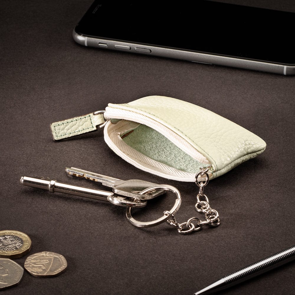 Miniature leather coin purse with key chain, mint green, lifestyle