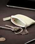 Miniature leather coin purse with key chain, mint green, lifestyle